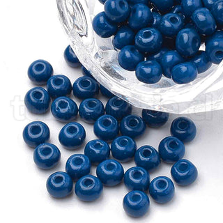 Mostacillón 6/0. Cuentas de vidrio pintadas y horneadas, redondas, disponibilidad en varios colores, 4~4.5x3 mm. 15 gramos.