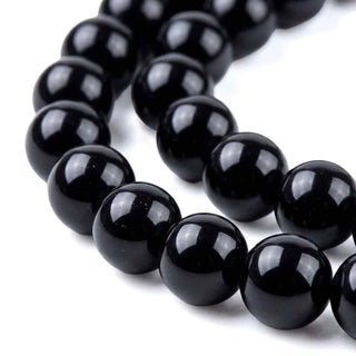 Abalorio Piedra Sintética Negra Brillante Redonda 6 mm | 1 tira
