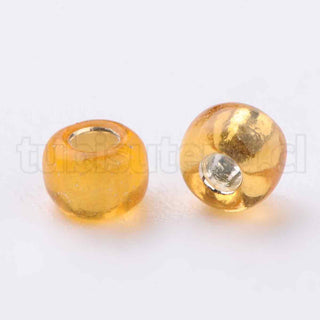 Mostacilla centro de plata 8/0. Abalorio de vidrio con orificio revestido, varios tonos para seleccionar, 3 mm.