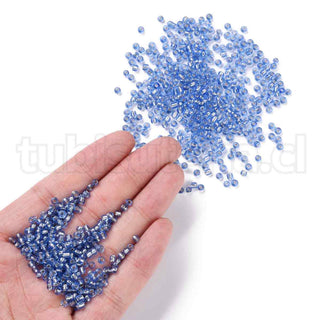 Mostacilla centro de plata 8/0. Abalorio de vidrio con orificio revestido, varios tonos para seleccionar, 3 mm.