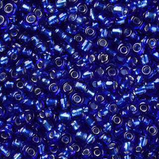 Mostacilla centro de plata 8/0. Abalorio de vidrio con orificio revestido, varios tonos para seleccionar, 3 mm.