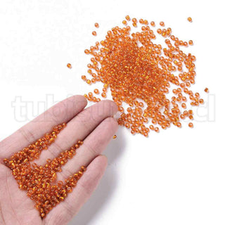 Mostacilla centro de plata 8/0. Abalorio de vidrio con orificio revestido, varios tonos para seleccionar, 3 mm.