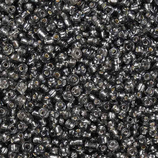 Mostacilla centro de plata 8/0. Abalorio de vidrio con orificio revestido, varios tonos para seleccionar, 3 mm.