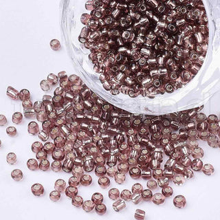 Mostacilla centro de plata 8/0. Abalorio de vidrio con orificio revestido, varios tonos para seleccionar, 3 mm.
