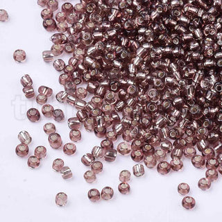 Mostacilla centro de plata 8/0. Abalorio de vidrio con orificio revestido, varios tonos para seleccionar, 3 mm.