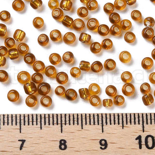Mostacilla centro de plata 8/0. Abalorio de vidrio con orificio revestido, varios tonos para seleccionar, 3 mm.