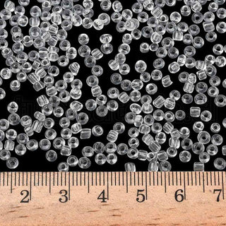 Mostacilla 8/0. Cuentas de vidrio redondeadas, color transparente, varios tonos para seleccionar,, cerca de 3 mm.