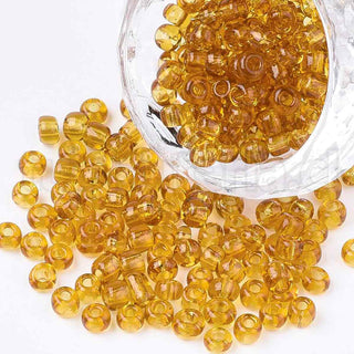 Mostacilla 8/0. Cuentas de vidrio redondeadas, color transparente, varios tonos para seleccionar,, cerca de 3 mm.