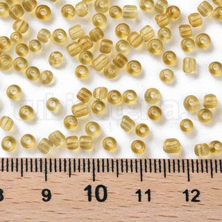 Mostacilla 8/0. Cuentas de vidrio redondeadas, color transparente, varios tonos para seleccionar,, cerca de 3 mm.