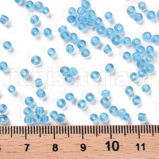 Mostacilla 8/0. Cuentas de vidrio redondeadas, color transparente, varios tonos para seleccionar,, cerca de 3 mm.