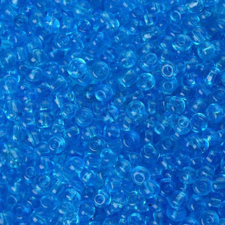 Mostacilla 8/0. Cuentas de vidrio redondeadas, color transparente, varios tonos para seleccionar,, cerca de 3 mm.