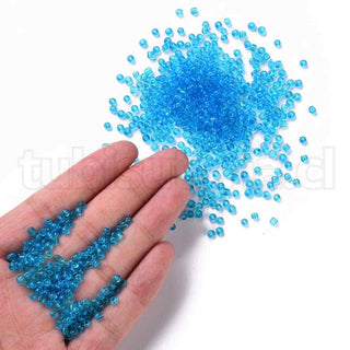 Mostacilla 8/0. Cuentas de vidrio redondeadas, color transparente, varios tonos para seleccionar,, cerca de 3 mm.