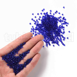 Mostacilla 8/0. Cuentas de vidrio redondeadas, color transparente, varios tonos para seleccionar,, cerca de 3 mm.