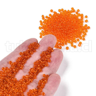 Mostacilla 8/0. Cuentas de vidrio redondeadas, color transparente, varios tonos para seleccionar,, cerca de 3 mm.